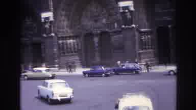 Paris France (1967): VINTAGE AUTOMOBILES DRIVING THROUGH AN INTERSECTION IN LONDON