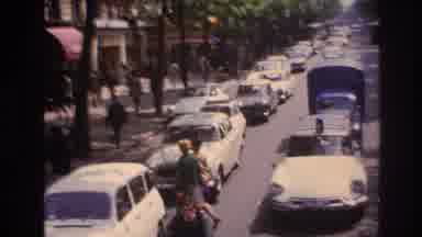 Paris France (1967): Driving Down The Street Filled With Extensive Traffic In A
