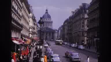 Paris France (1967): A Busy Street With People Going To And Fro The Crosswalks