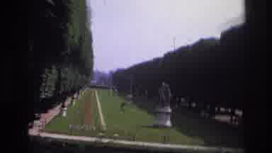 Paris France (1967): Statues In A Garden And The L'arc De Triomphe Are Part Of The