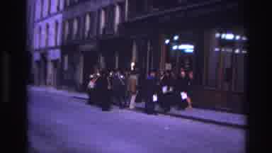 Paris France (1967): A Crowd Of People Outside A Building Some In The Street,