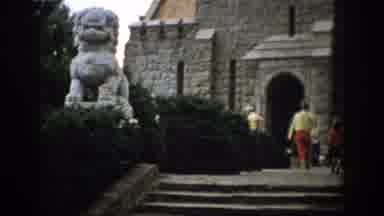 Colorado USA-1959: Rock Vatican Building with Lion Statue and Visitors Walking Stone Stairs