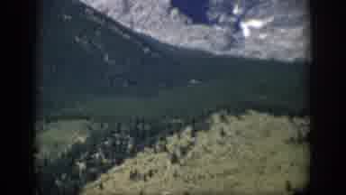 Colorado USA (1959): Flowing River And A Canyon With Large Hills On Each Side