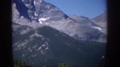 Colorado USA (1959): Mountain Rising Above Lower Slopes With Trees In Foreground