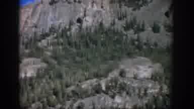 Colorado USA (1959): Mountain Rising Above Lower Slopes With Trees In Foreground