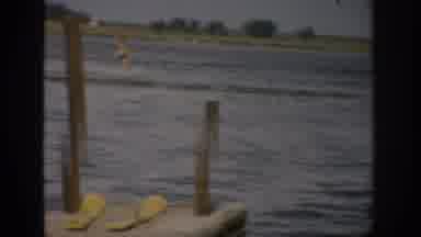 Colorado USA (1959): Man Skiing Across Water On A Lake