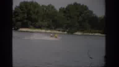 Colorado USA (1959): High Speed Speed Boat Pulling Water Skier On A Warm Summer's