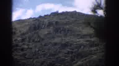 Colorado USA (1959): Green Forest On Mountain Side With Bright Cloudy Sky