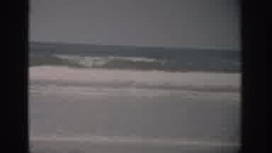 Florida USA (1959): Scene Of Incoming Tidal Waves Roll And Crash Toward Beach