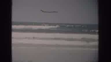 Florida USA (1959): White Sea Foam Large Waves Rolling Onto Beach Under Cloudy Sky