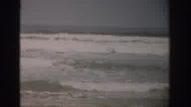Florida USA (1959): Grainy Vintage Footage Of Sea Foam And Waves Gently Crashing