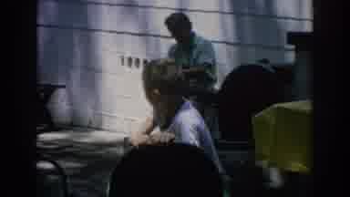 Blainsport Pennsylvania USA (1962): Kid Playing In The Backyard With A Chair And