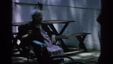 Blainsport Pennsylvania USA-1962: Elderly Woman In Wheelchair With Family At Picnic Table