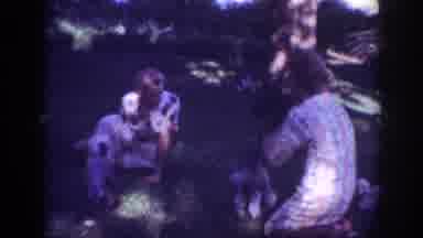 Blainsport Pennsylvania USA (1962): Two Ladies Playing With Four Puppies Outside