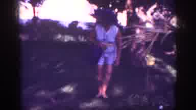 Blainsport Pennsylvania USA (1962): Lady In A Hat Looking At Shrubs Under A Tree