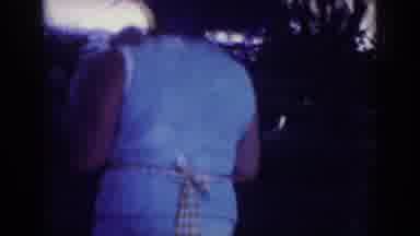 Blainsport Pennsylvania USA (1962): Lady Walking To Man While Outside