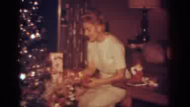 Blainsport Pennsylvania USA (1962): Woman Putting Gifts Under Christmas Tree