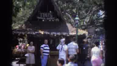 Anaheim California USA (1962): Line Of People Walking Towards Wooded Tropical