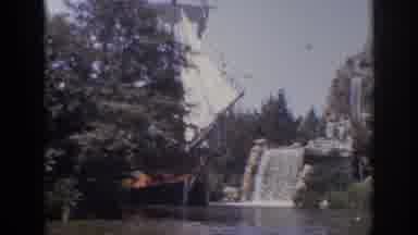 Anaheim California USA (1962): A Pirate Ship Sailing Down Stream Past A Small