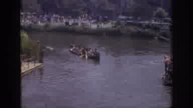 Anaheim California USA (1962): Several People Paddling In A Boat