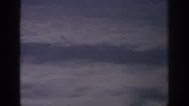 Anaheim California USA (1962): White Clouds Going By Fast In The Sky High Up In