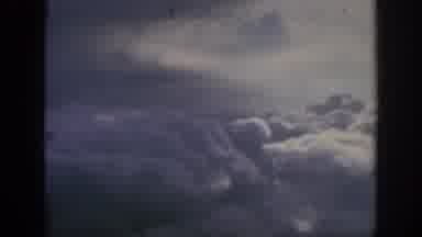 Anaheim California USA-1962: View Of Thick And Fluffy Clouds Outside A Window On