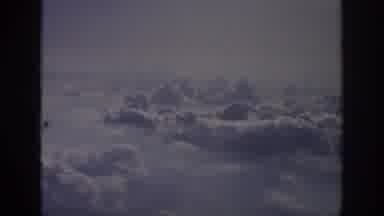 Anaheim California USA (1962): Fluffy White Clouds Through Left Side Airplane