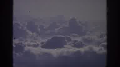 Anaheim California USA (1962): Camera Zooms In On White Fluffy Clouds