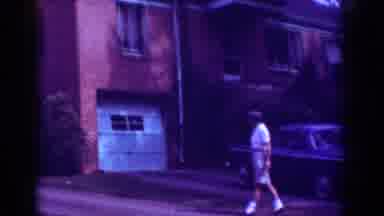 Raleigh North Carolina USA (1962): A Man Strolling Outside