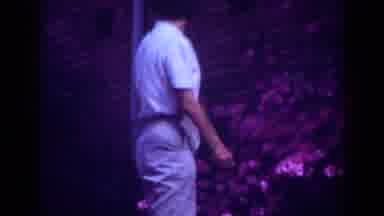 Raleigh North Carolina USA (1962): Lady Admiring The Beautiful Hot Pink Flowers In