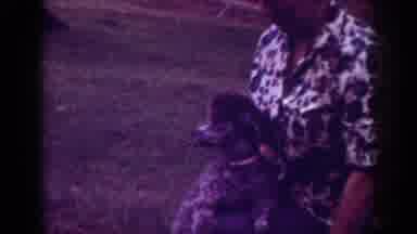 RALEIGH NORTH CAROLINA USA-1962: Funny Dog With Its Owner Looking To Enjoy As