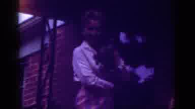 Raleigh North Carolina USA (1962): Women Holding Dog Outside On A Cloudy Day In