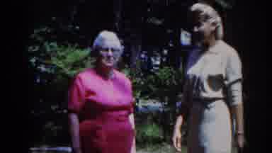 Raleigh North Carolina USA (1962): Conversation Between Two Friends In Their Yard
