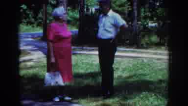 Raleigh North Carolina USA (1962): An Old Man And An Old Lady In The Garden Having