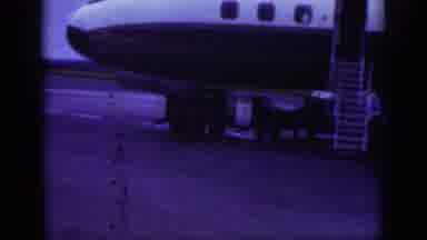 Raleigh North Carolina USA (1962): Small Crowd Watches Luggage Loaded Onto