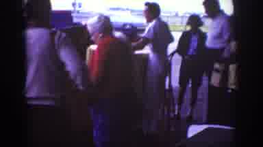 Raleigh North Carolina USA (1962): People Remove A Large Wooden Crate And A Collie