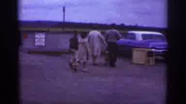 Raleigh North Carolina USA (1962): Family With Two Kids Pet A Dog Near Their Car,