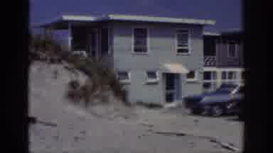 Raleigh North Carolina USA (1962): Lady In Yellow Dress Walking Down The Stairs Of