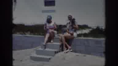 Raleigh North Carolina USA (1962): Two Women And Child Sitting On Steps At A Beach