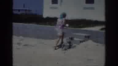 Raleigh North Carolina USA (1962): Grainy Footage Woman With Headwear Walking Dog
