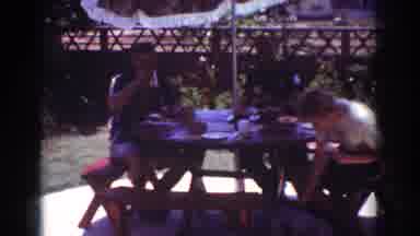 Yorba Linda California USA (1962): Three People Eating In The Garden