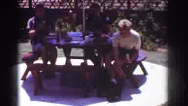 Yorba Linda California USA (1962): Adult Couple Sitting At Picnic Table Drinking