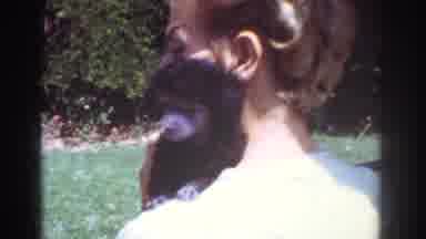 Yorba Linda California USA-1962: Family In Backyard With Black Puppy