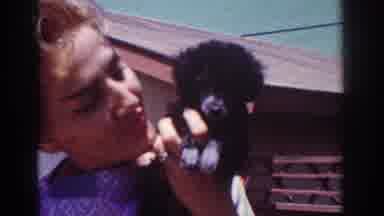 Yorba Linda California USA (1962): Woman Plays With Dog In The Outdoor Area Of