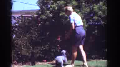 Yorba Linda California USA (1962): Woman Plays With A Dog