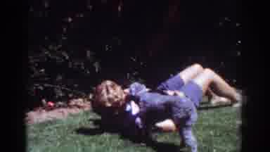 Yorba Linda California USA (1962): Female Laying On Grass Area Outside, Poodle Dog