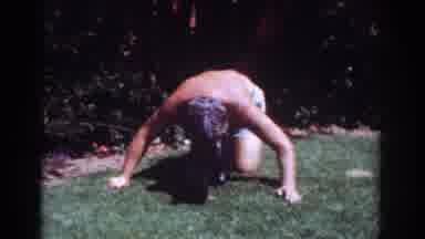 Yorba Linda California USA (1962): Shirtless Man Playing With Pets