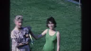 Memphis Tennessee USA (1963): Women Hanging Around Petting A Dog Outside