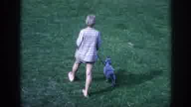 Memphis Tennessee USA (1963): Video, Woman Walking Dog To A Hotel Pool Area And