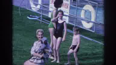 Memphis Tennessee USA (1963): Children In Swimsuits As A Mother Holds Her Baby